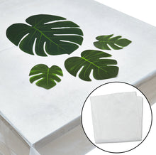 Load image into Gallery viewer, Four palm leaves on white table cloth with close up view